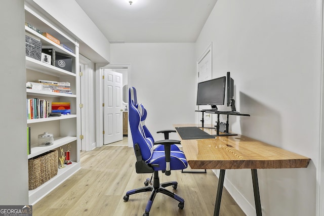 office space with wood finished floors