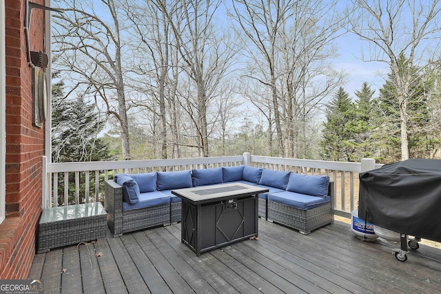 deck featuring grilling area and an outdoor living space