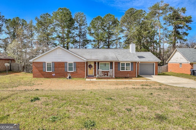 3431 Toms Dr, Augusta, GA 30906 - single story home featuring driveway, covered porch, an attached garage, fence, and brick siding