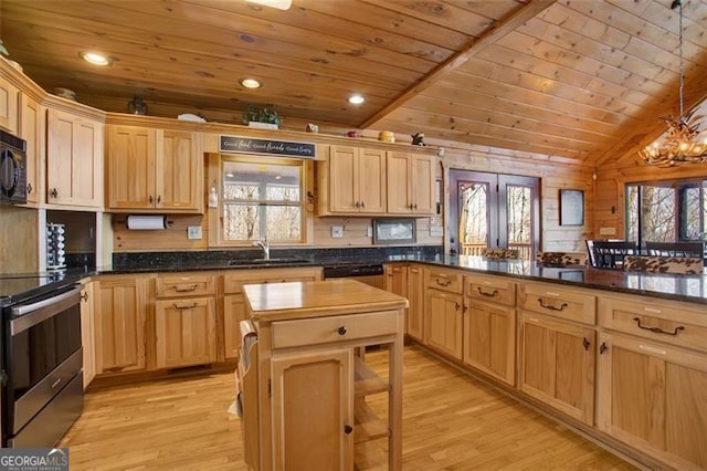 kitchen with a sink, stainless steel appliances, wooden ceiling, and light wood finished floors