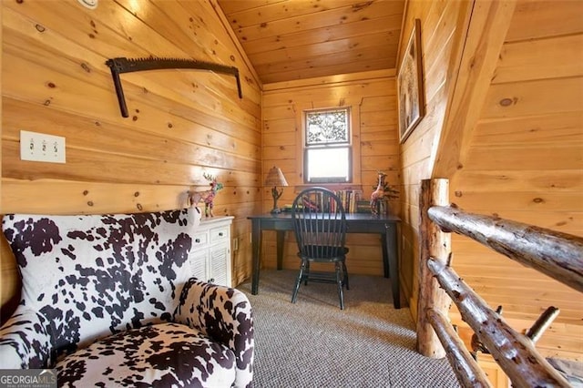 carpeted office space with vaulted ceiling, wood ceiling, and wood walls