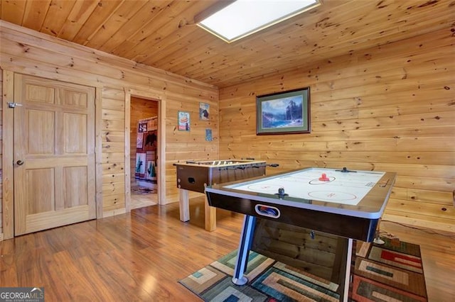 game room with wooden ceiling and wood finished floors