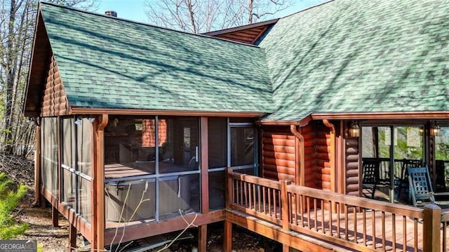 deck featuring a sunroom