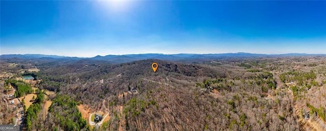 mountain view featuring a wooded view