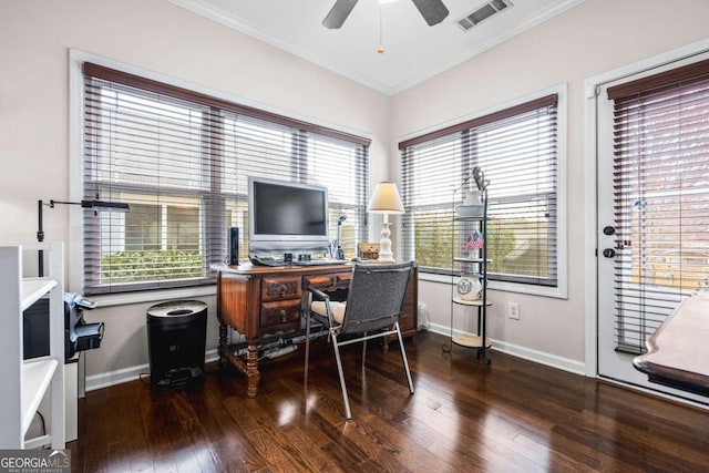 office area with visible vents, baseboards, crown molding, and hardwood / wood-style flooring