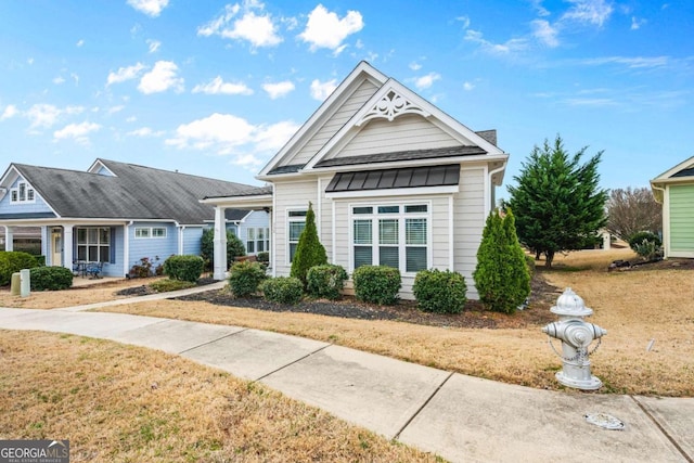 view of front of property with a front lawn