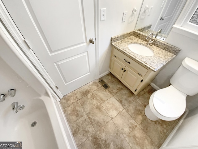 full bath with vanity, toilet, visible vents, and tile patterned flooring