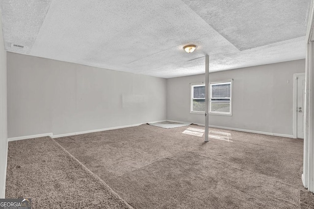 5338 Timor Trl, Lithonia, GA 30038 - empty room with a textured ceiling and carpet floors