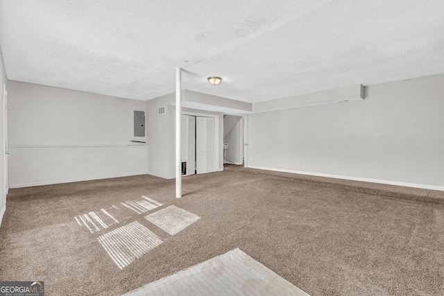 5338 Timor Trl, Lithonia, GA 30038 - carpeted spare room with a textured ceiling and electric panel