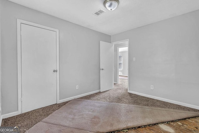 5338 Timor Trl, Lithonia, GA 30038 - unfurnished bedroom featuring carpet and baseboards