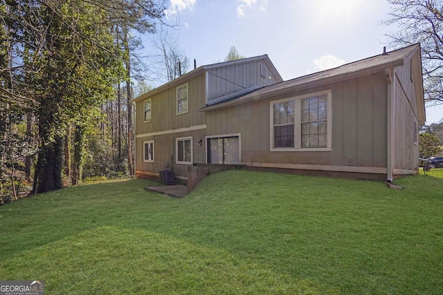 5338 Timor Trl, Lithonia, GA 30038 - back of property with a yard and board and batten siding
