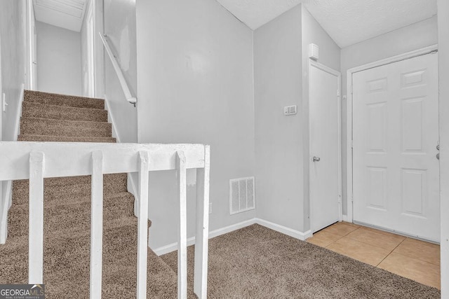 5338 Timor Trl, Lithonia, GA 30038 - entrance foyer featuring stairway and tile patterned flooring