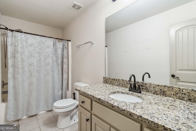 full bath featuring vanity, visible vents, tile patterned flooring, shower / bath combo with shower curtain, and toilet