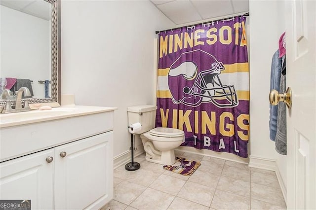 bathroom featuring vanity, tile patterned floors, toilet, and a shower with shower curtain