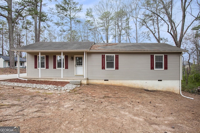 view of front facade with crawl space and a porch
