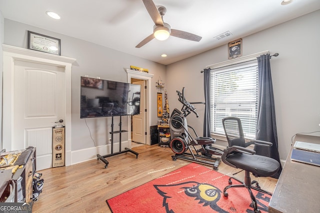 exercise area with visible vents, baseboards, recessed lighting, wood finished floors, and a ceiling fan