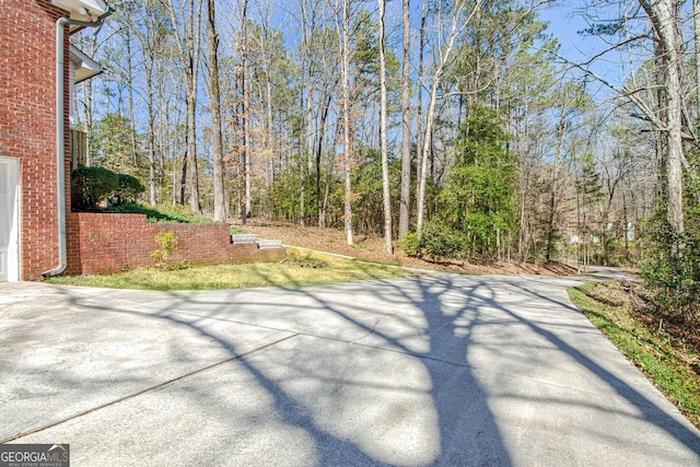 view of patio / terrace with driveway