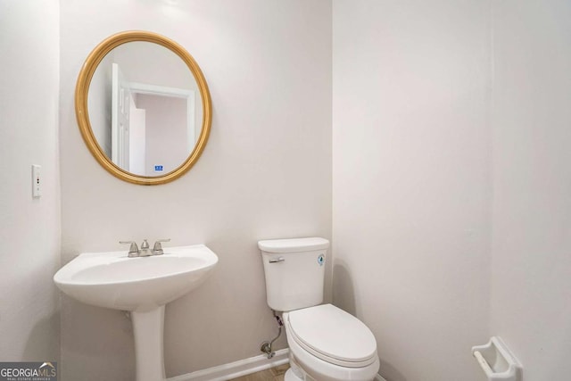 10950 Glenhurst Pass, Duluth, GA 30097 - half bathroom featuring toilet and baseboards