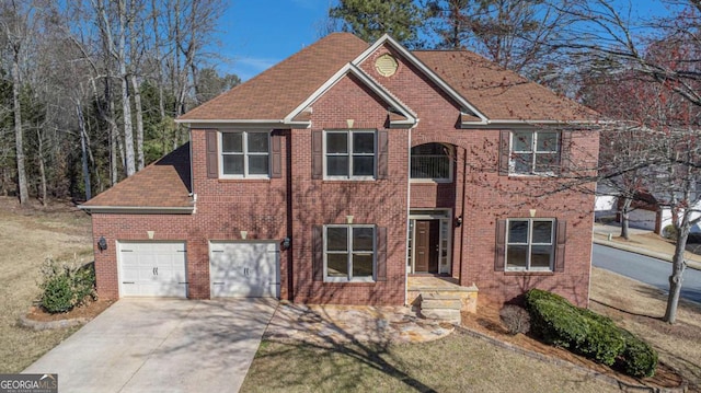 10950 Glenhurst Pass, Duluth, GA 30097 - colonial home featuring concrete driveway and brick siding