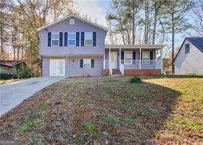 split level home with a porch