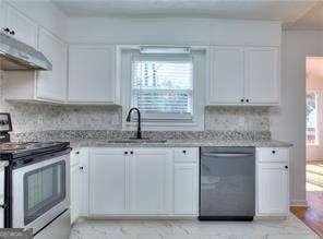 kitchen featuring under cabinet range hood, a sink, white cabinetry, stainless steel electric range, and dishwasher