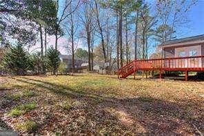 view of yard featuring a deck