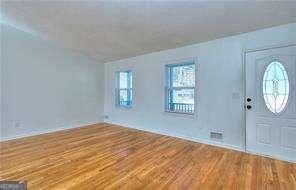 entrance foyer with wood finished floors