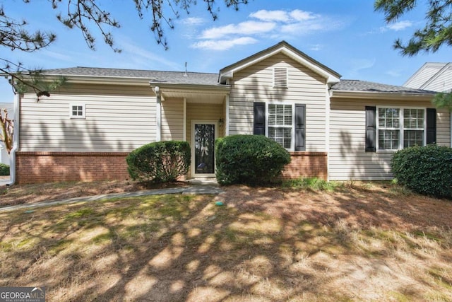 ranch-style home with brick siding