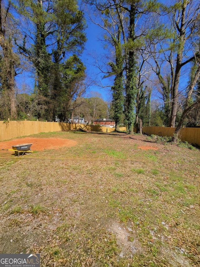 view of yard with fence