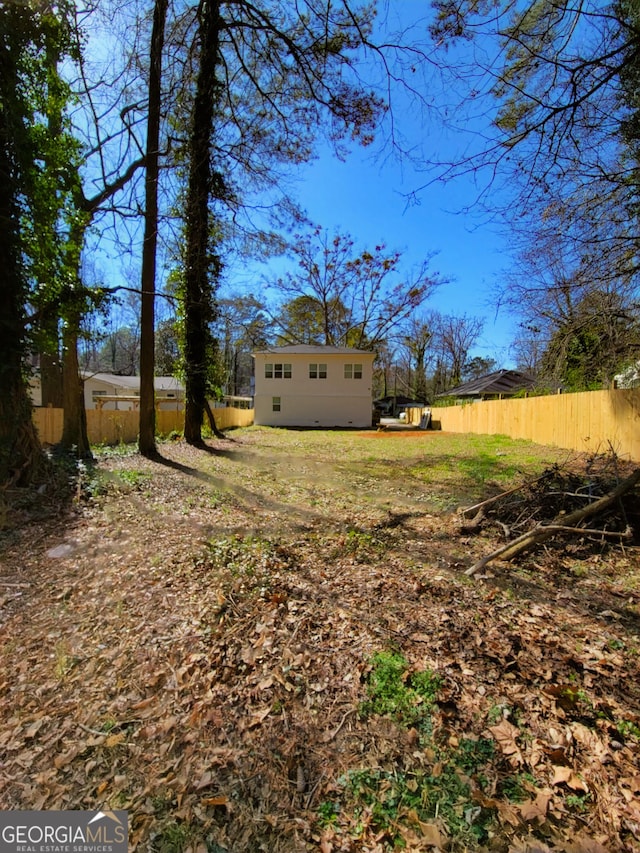 view of yard featuring fence