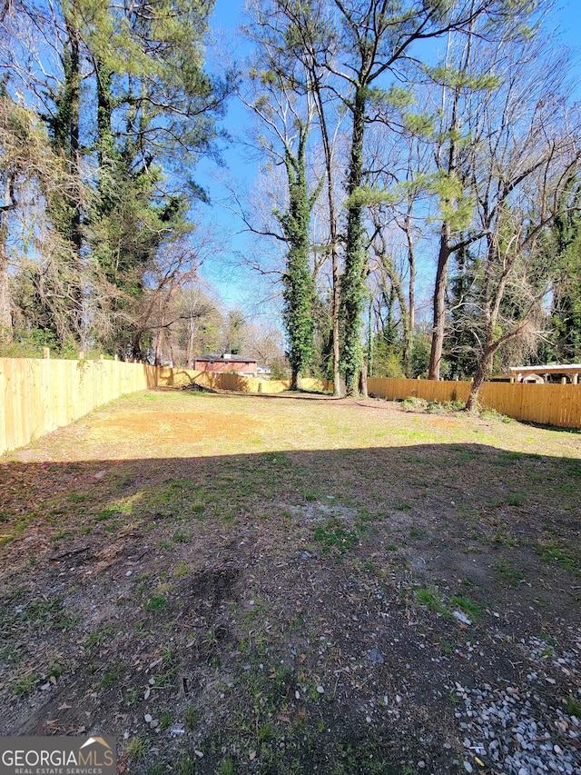 view of yard featuring fence