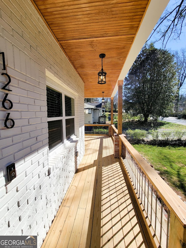 wooden deck with a porch