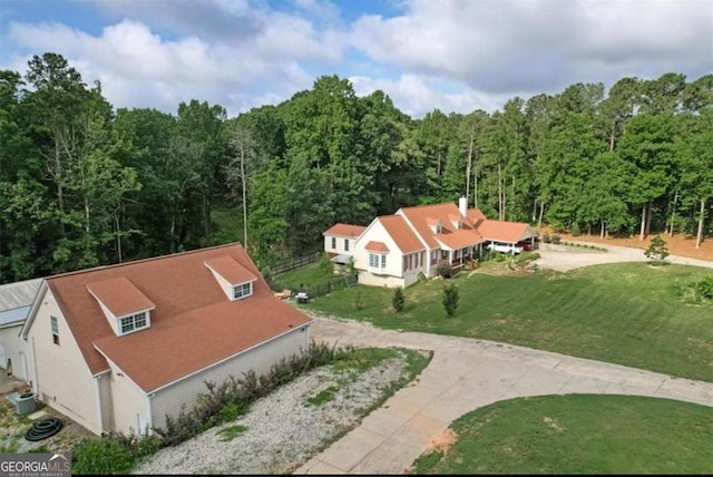 aerial view with a wooded view