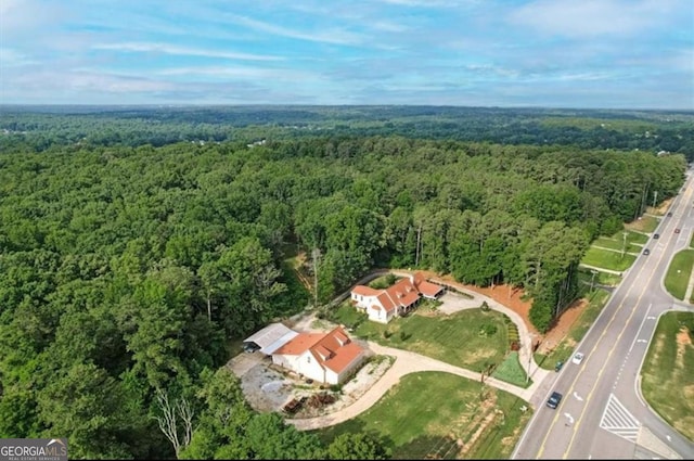 aerial view featuring a forest view