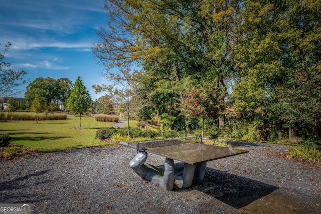 view of home's community featuring a yard