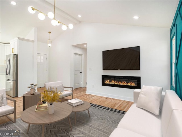 living area featuring light wood finished floors, baseboards, beam ceiling, a glass covered fireplace, and high vaulted ceiling