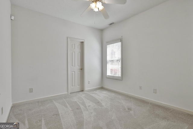 41 Eastlake Lndg, Newnan, GA 30265 - unfurnished room with light carpet and a ceiling fan