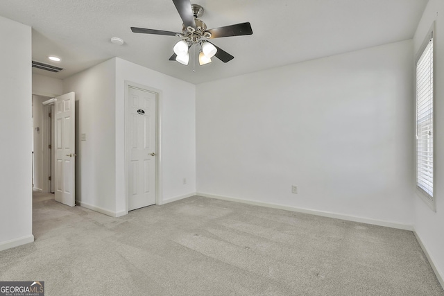 41 Eastlake Lndg, Newnan, GA 30265 - unfurnished bedroom with carpet floors and ceiling fan