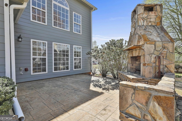 41 Eastlake Lndg, Newnan, GA 30265 - view of patio / terrace featuring an outdoor stone fireplace