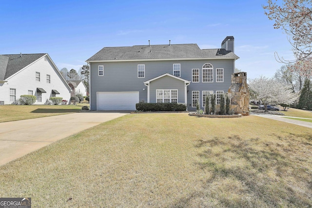 41 Eastlake Lndg, Newnan, GA 30265 - view of front of house with a garage, a chimney, driveway, and a front lawn