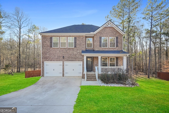 view of front facade with brick siding, a porch, driveway, and a front yard