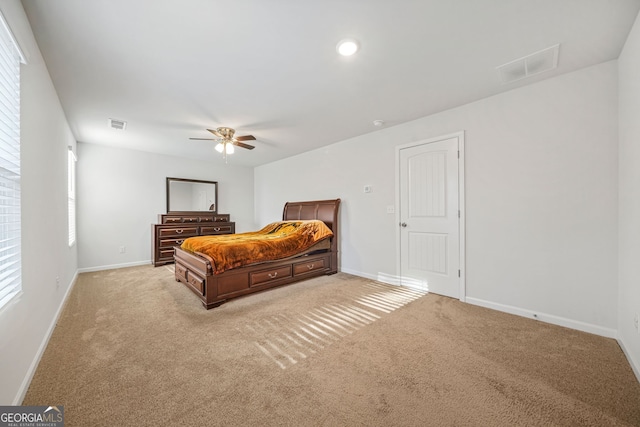 bedroom featuring a ceiling fan, baseboards, visible vents, recessed lighting, and carpet flooring