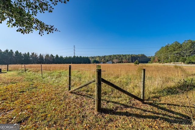 view of gate featuring fence