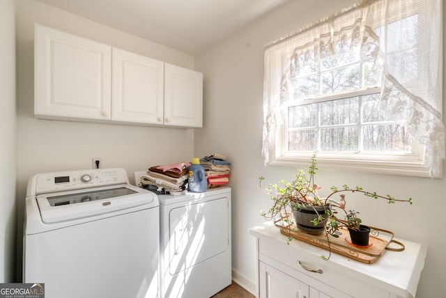 1650 Pierce Dairy Rd, Madison, GA 30650 - washroom with cabinet space and washer and clothes dryer