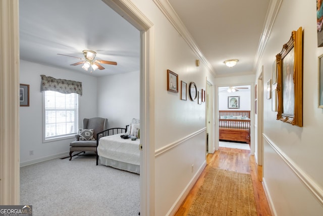 1650 Pierce Dairy Rd, Madison, GA 30650 - hall with crown molding and light wood finished floors