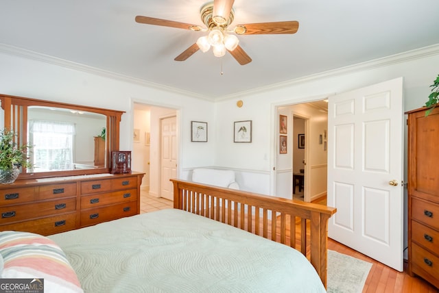 1650 Pierce Dairy Rd, Madison, GA 30650 - bedroom featuring ornamental molding, light wood-style flooring, and ceiling fan