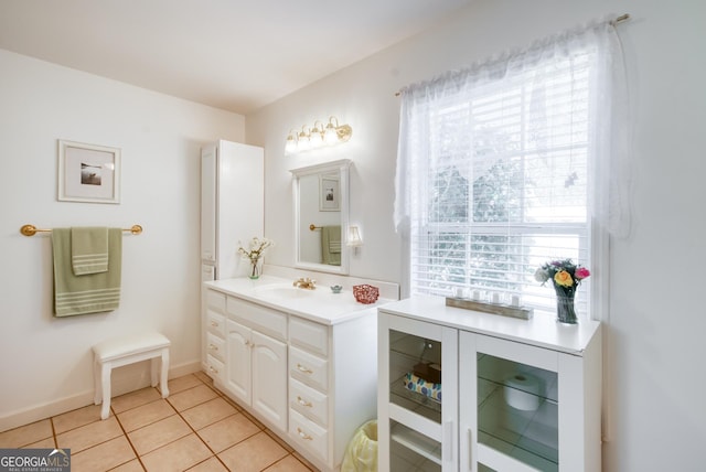 1650 Pierce Dairy Rd, Madison, GA 30650 - bathroom featuring vanity, baseboards, and tile patterned flooring