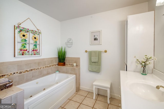 1650 Pierce Dairy Rd, Madison, GA 30650 - full bath with tile patterned floors, vanity, baseboards, and a tub with jets