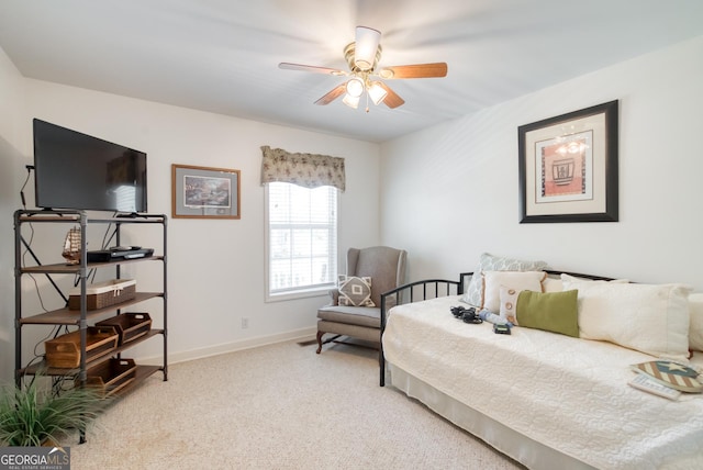 1650 Pierce Dairy Rd, Madison, GA 30650 - bedroom with light carpet, baseboards, and a ceiling fan