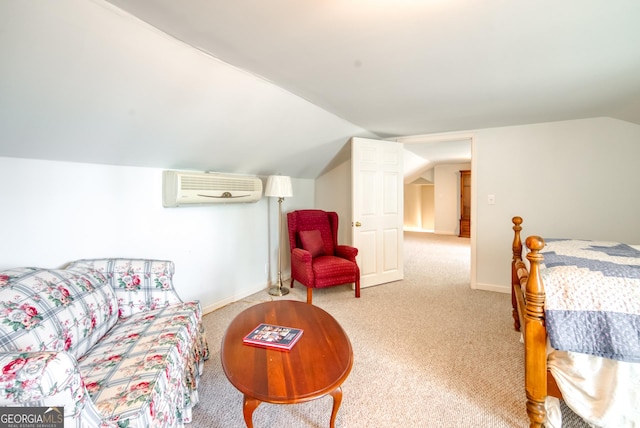 1650 Pierce Dairy Rd, Madison, GA 30650 - bedroom with light carpet, baseboards, an AC wall unit, and vaulted ceiling